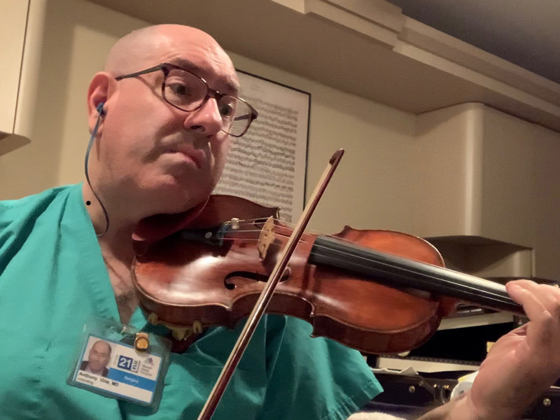Dr. Vine playing the violin